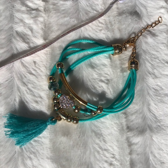 Beautiful teal banded bracelet with jeweled heart - Picture 8 of 11